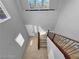 An interior shot of the home's staircase showcases the high ceilings, staircase, and abundant natural light at 2832 Aragon Terrace Way, Henderson, NV 89044