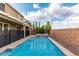 Backyard pool and spa surrounded by desert landscaping and privacy walls at 2832 Aragon Terrace Way, Henderson, NV 89044