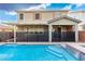 Backyard pool with attached spa and covered patio, perfect for entertaining guests at 2832 Aragon Terrace Way, Henderson, NV 89044
