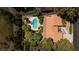 Bird's eye view of a property featuring a sparkling pool, well-manicured backyard, and a tile roof at 3007 La Mesa Dr, Henderson, NV 89014