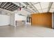 Spacious garage with epoxy floors, built-in storage cabinets, and overhead storage racks at 3007 La Mesa Dr, Henderson, NV 89014