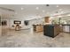 Open-concept living space combining kitchen, dining, and living areas for easy entertaining at 3007 La Mesa Dr, Henderson, NV 89014