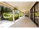 Expansive covered patio perfect for outdoor entertaining, complete with lush greenery and a comfortable seating area at 3007 La Mesa Dr, Henderson, NV 89014