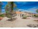 Wide shot of the home’s backyard, highlighting the desert landscaping and peaceful outdoor space at 3116 Richland Dr, Las Vegas, NV 89134