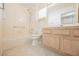 Well-lit bathroom featuring a tub-shower combo and a wooden vanity for a clean aesthetic at 3116 Richland Dr, Las Vegas, NV 89134