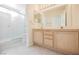 Bathroom featuring double sinks, ample counter space, and a glass enclosed shower at 3116 Richland Dr, Las Vegas, NV 89134