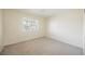 Comfortable bedroom with neutral carpet and a bright window offering pleasant natural light at 3116 Richland Dr, Las Vegas, NV 89134