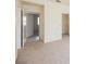 View of a carpeted bedroom featuring a closet and doorway leading to another room at 3116 Richland Dr, Las Vegas, NV 89134