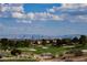 Expansive cityscape and serene golf course, offering a unique blend of city and nature views at 3116 Richland Dr, Las Vegas, NV 89134