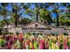 Inviting Sun City Summerlin entrance with colorful flowers in a well maintained Del Webb community at 3116 Richland Dr, Las Vegas, NV 89134