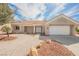 Attractive single-story home featuring low maintenance landscaping and a two-car garage at 3116 Richland Dr, Las Vegas, NV 89134