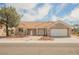 Attractive single-story home featuring low maintenance landscaping and a two-car garage at 3116 Richland Dr, Las Vegas, NV 89134