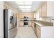 Modern kitchen with stainless steel appliances and granite countertops at 3116 Richland Dr, Las Vegas, NV 89134
