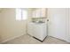 Laundry room with washer, dryer, and storage cabinets at 3116 Richland Dr, Las Vegas, NV 89134