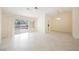 Bright living area features tile flooring, natural light from back slider, and modern pendant lighting at 3116 Richland Dr, Las Vegas, NV 89134