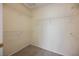 Walk-in closet with wall-mounted white wire shelving and carpet floors at 3116 Richland Dr, Las Vegas, NV 89134