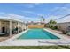 Outdoor pool with a covered patio perfect for outdoor entertaining in the sun and relaxing in the backyard at 3140 Sundown Dr, Las Vegas, NV 89169