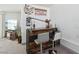 Home bar area with rustic wood accents, bar stools, and decor at 3140 Sundown Dr, Las Vegas, NV 89169