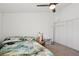 Bedroom with ceiling fan, plush bedding, and large closet at 3140 Sundown Dr, Las Vegas, NV 89169