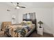 Bedroom with a modern styled lamp and an attached bathroom at 3140 Sundown Dr, Las Vegas, NV 89169