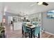 Inviting dining area with views of the kitchen and outdoor pool area, perfect for Gathering meals at 3140 Sundown Dr, Las Vegas, NV 89169