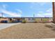 Quaint single-story house boasting a desert landscape, mature trees, and a convenient covered parking area at 3140 Sundown Dr, Las Vegas, NV 89169