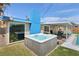 Outdoor hot tub, adjacent to a covered patio, creates a relaxing backyard oasis at 3140 Sundown Dr, Las Vegas, NV 89169