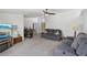 Spacious living room with plush gray sofas and neutral walls, offering a comfortable living space at 3140 Sundown Dr, Las Vegas, NV 89169