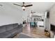 Open living space combining a living room, dining area, and modern kitchen for seamless entertaining at 3140 Sundown Dr, Las Vegas, NV 89169