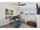 Home office with natural light, modern desk, and artwork at 3140 Sundown Dr, Las Vegas, NV 89169
