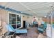 Enjoyable covered patio area with ample seating, a barbecue grill and pool views at 3140 Sundown Dr, Las Vegas, NV 89169
