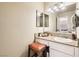 Bathroom featuring granite countertops, white cabinets, and plenty of counter space at 3151 Soaring Gulls Dr # 1201, Las Vegas, NV 89128