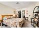 Relaxing bedroom with carpet, comfortable bed, and a view of an ensuite bathroom at 3151 Soaring Gulls Dr # 1201, Las Vegas, NV 89128