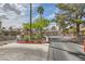 Gated neighborhood entrance with mature trees at 3151 Soaring Gulls Dr # 1201, Las Vegas, NV 89128