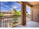 Balcony with great views and black metal railing with hanging basket decor at 3825 Ormond Beach St # 203, Las Vegas, NV 89129