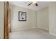 Bright bedroom featuring a ceiling fan and a picture on the wall at 3825 Ormond Beach St # 203, Las Vegas, NV 89129