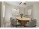 Inviting dining room with modern light fixture, soft paint, and a neutral color palette throughout at 3825 Ormond Beach St # 203, Las Vegas, NV 89129