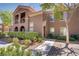 Charming two-story condo features desert landscaping and a private balcony, ideal for relaxing outdoors at 3825 Ormond Beach St # 203, Las Vegas, NV 89129