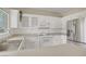 Efficient kitchen with white cabinets and a stainless steel refrigerator at 3825 Ormond Beach St # 203, Las Vegas, NV 89129