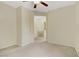 Spacious living room with neutral carpet and paint; perfect for relaxing at 3825 Ormond Beach St # 203, Las Vegas, NV 89129