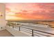View of the city from the tiled balcony with railings at 394 Solitude Peak Ln, Henderson, NV 89012