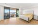 Inviting main bedroom with balcony access, offering stunning views at 394 Solitude Peak Ln, Henderson, NV 89012