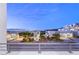 Street view with mountain views and modern home exteriors at 394 Solitude Peak Ln, Henderson, NV 89012