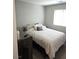 Inviting bedroom with a comfortable bed, soft pillows, and a peaceful, light-filled space at 4109 Cloudless Ave, North Las Vegas, NV 89081