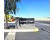 Stone monument sign that reads 'Summit Knoll' against a clear blue sky with desert landscape in the background at 4109 Cloudless Ave, North Las Vegas, NV 89081