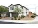Charming two-story home features a brown garage door and desert landscaping at 4109 Cloudless Ave, North Las Vegas, NV 89081