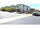 Exterior view showcasing a two-story home with a two car garage, neutral stucco exterior and low maintenance yard at 4109 Cloudless Ave, North Las Vegas, NV 89081