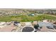 Primary-planned community with lush park, playground, and residences, creating a desirable living environment at 4145 Lunar Canyon Ave, North Las Vegas, NV 89084