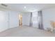 Bedroom featuring neutral carpet, bright walls, and window at 4145 Lunar Canyon Ave, North Las Vegas, NV 89084