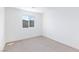 Bright bedroom with a window overlooking the neighborhood at 4145 Lunar Canyon Ave, North Las Vegas, NV 89084